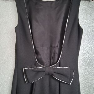 Cach`e Black Jumpsuit With A Scoop Back Outlined With Rhinestones   Size 6